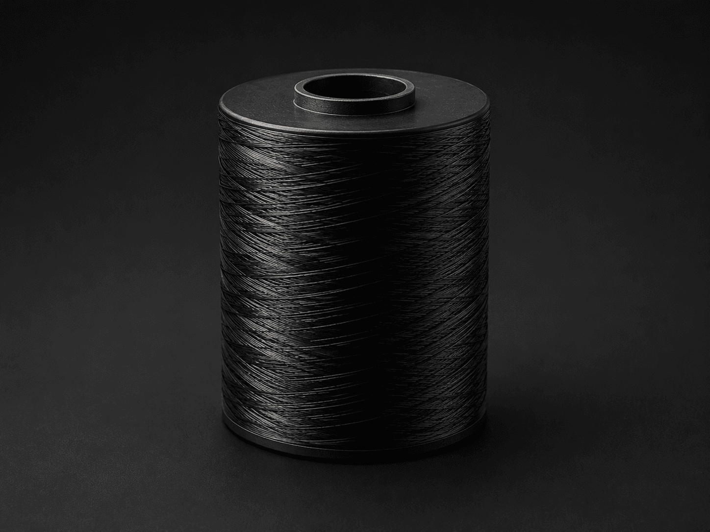 Spool of fine black conductive carbon fiber yarn